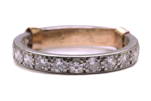 Lot 169 - A diamond eternity ring, comprises an array of...