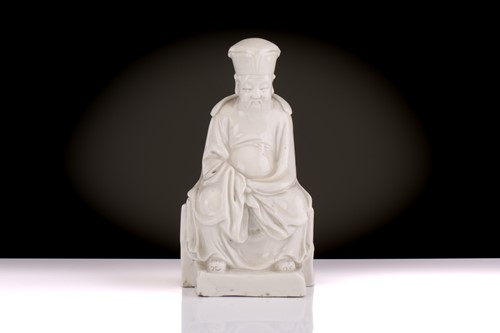 Lot 149 - A Chinese Dehua blanc de chine figure of a...