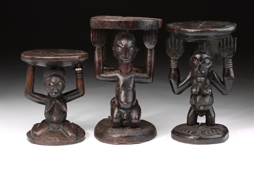 Lot 29 - A Luba double caryatid stool, Democratic...