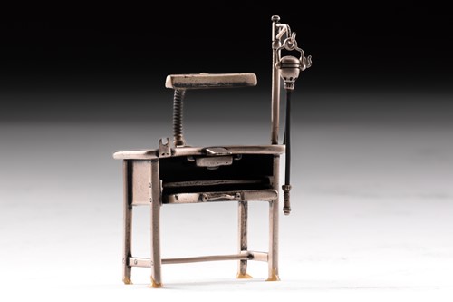 Lot 268 - A miniature model of a jeweller's workbench,...