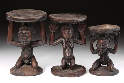 Lot 47 - A Luba double caryatid stool, Democratic...