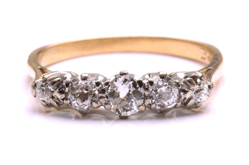 Lot 81 - A five-stone diamond half hoop ring, comprises...