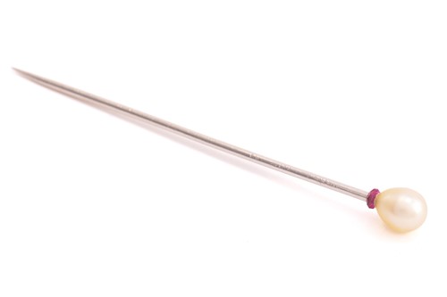 Lot 164 - A pearl stick pin, the egg-shaped pearl has...