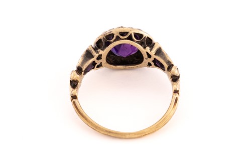 Lot 110 - A Victorian amethyst and diamond cluster ring,...