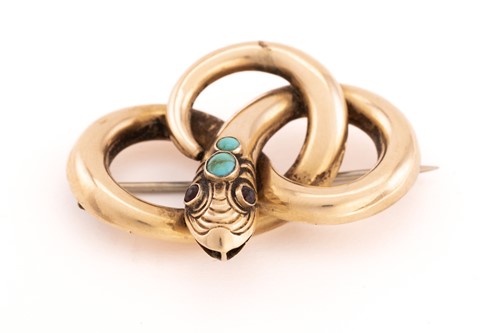 Lot 34 - A Victorian snake brooch, composed of an...