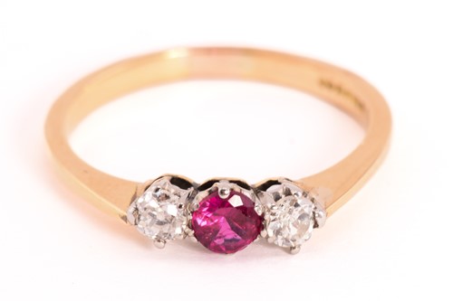 Lot 119 - A ruby and diamond three-stone ring in 18ct...