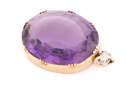 Lot 4 - A large amethyst and diamond pendant,...