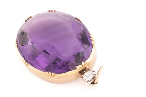 Lot 4 - A large amethyst and diamond pendant,...