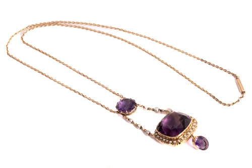 Lot 68 - An amethyst and seed pearl lavalier necklace,...