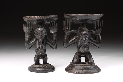 Lot 12 - Two Luba female caryatid stools, Democratic...