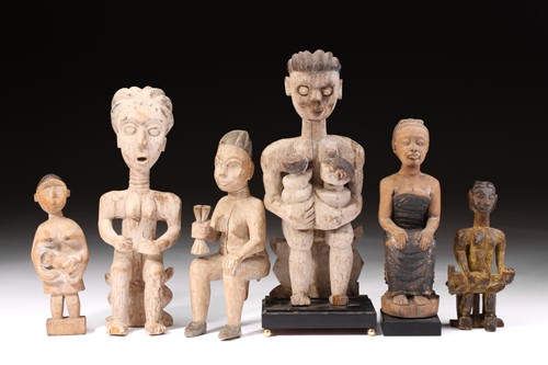 Lot 135 - A group of six Adan/Ewe maternal figures,...