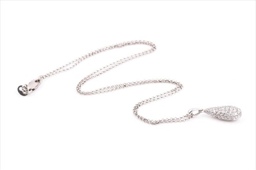 Lot 613 - An 18ct white gold and diamond pendant the...