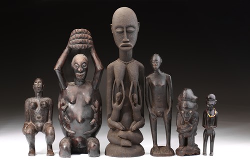 Lot 45 - A large Tanzanian female maternity figure,...