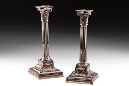 Lot 304 - A pair of Edwardian loaded silver Corinthian...