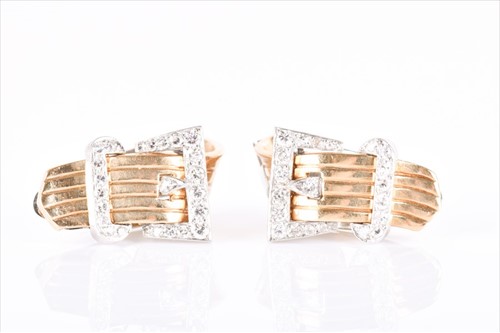Lot 514 - A pair of yellow metal and diamond buckle...