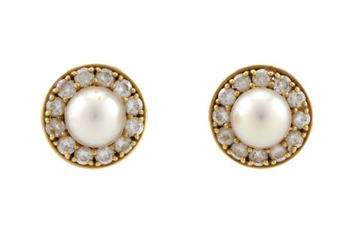 Lot 30 - A pair of pearl and diamond earrings in 18ct...