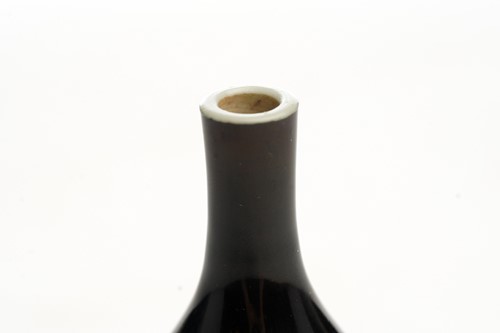 Lot 146 - A small Chinese mirror black glazed vase, Qing,...