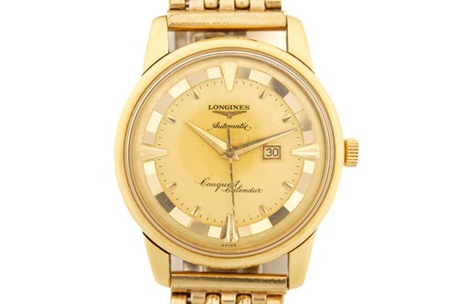 Lot 304 - A Longines automatic conquest calendar...