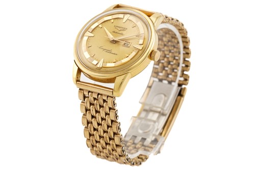Lot 304 - A Longines automatic conquest calendar...