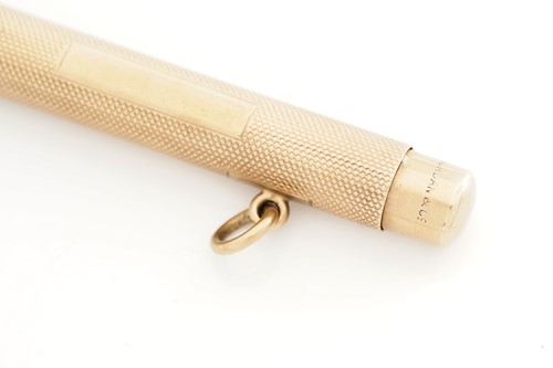 Lot 389 - A 9ct gold pencil holder by Sampson Mordan &