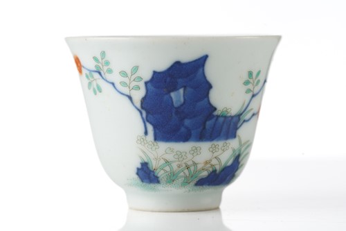 Lot 200 - A Chinese porcelain wine cup, painted with...