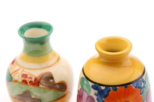 Lot 69 - Two Clarice Cliff miniature vases, ‘Gay Day’...