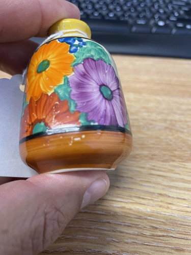 Lot 69 - Two Clarice Cliff miniature vases, ‘Gay Day’...