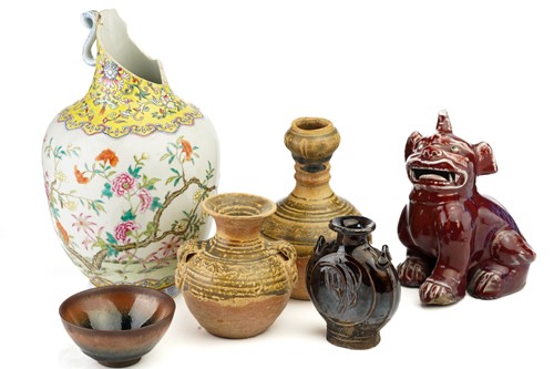 Lot 152 - A Chinese sang de boeuf glazed Pixiu, the...