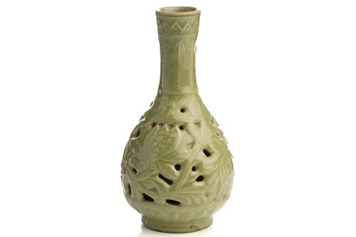 Lot 158 - A Chinese celadon double wall pierced vase,...