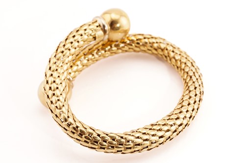 Lot 246 - A Stella Milano bypass bangle, comprises a...