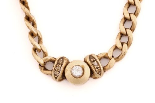 Lot 152 - A diamond set pendant necklace in 9ct yellow...