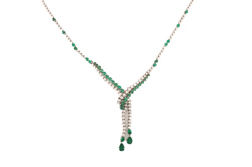 Lot 141 - An emerald and diamond necklace, of chevron...