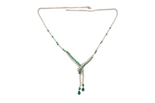 Lot 141 - An emerald and diamond necklace, of chevron...