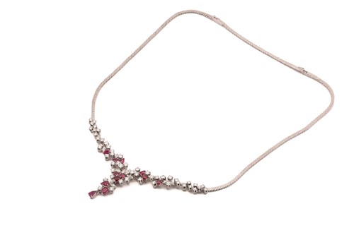 Lot 88 - A ruby and diamond necklace, claw set with...
