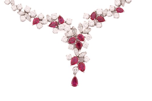 Lot 88 - A ruby and diamond necklace, claw set with...