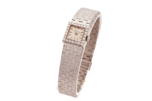 Lot 305 - Lady's Vertex white gold bracelet watch,...