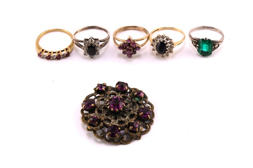 Lot 117 - Five gem-set rings and a brooch; to include a...