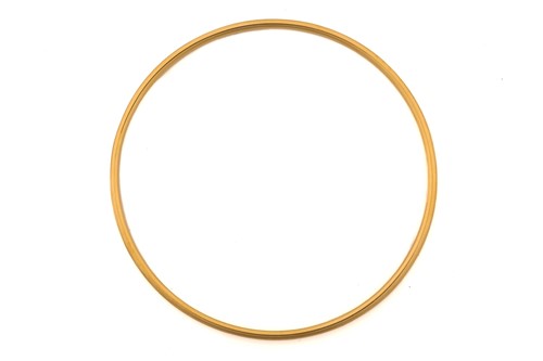 Lot 277 - Tiffany & Co. - A round wire stacking bangle...