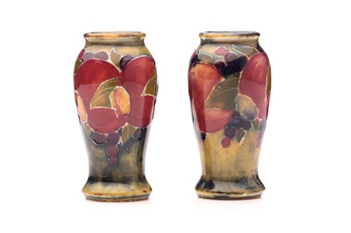 Lot 54 - A pair of William Moorcroft miniature...