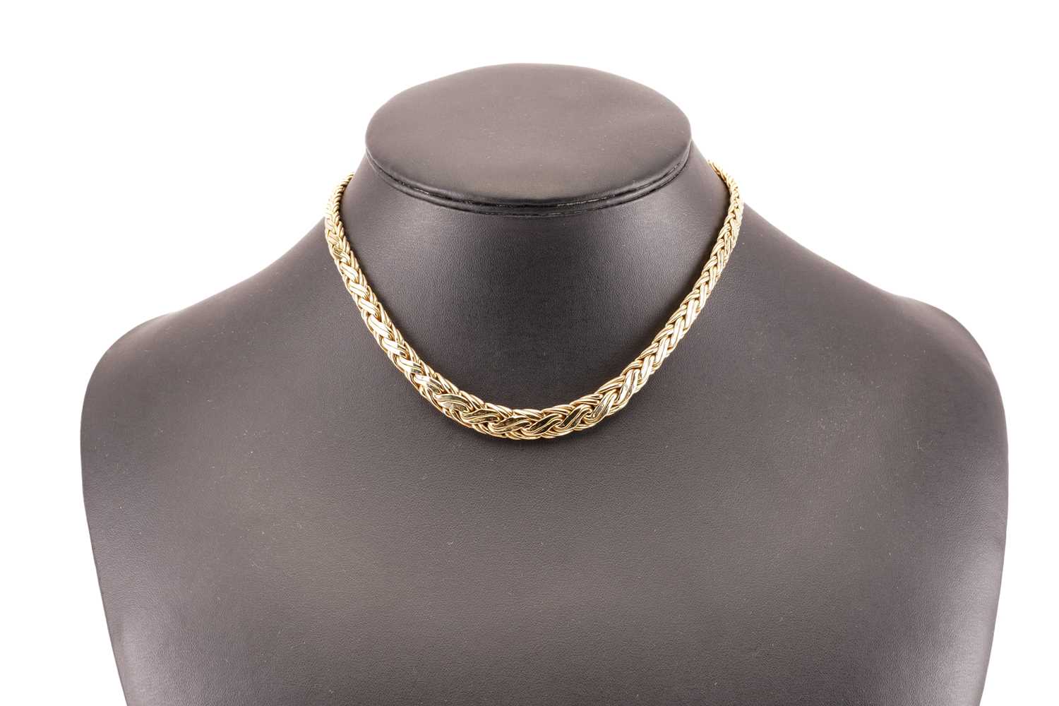 Lot 30 - Tiffany & Co. - A graduated wheat necklace in...