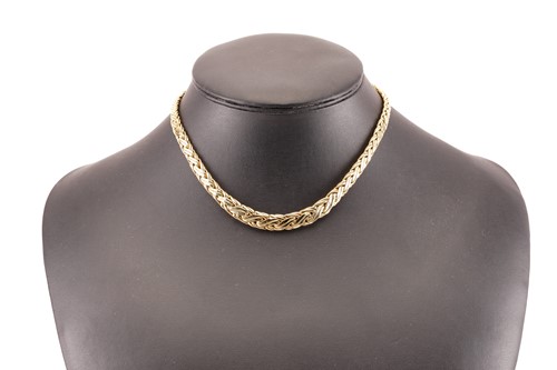 Lot 30 - Tiffany & Co. - A graduated wheat necklace in...