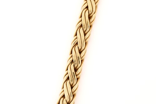 Lot 30 - Tiffany & Co. - A graduated wheat necklace in...