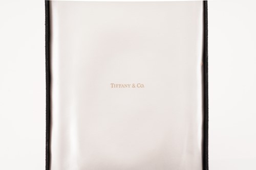 Lot 30 - Tiffany & Co. - A graduated wheat necklace in...