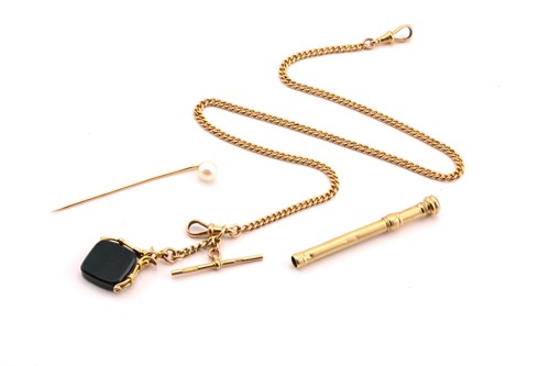 Lot 24 - An Albert pocket watch chain in 9ct gold, an S....