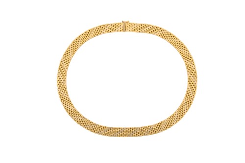Lot 75 - A seven-row brick link chain in 18ct gold, two-...