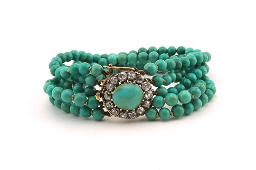 Lot 181 - A five-row turquoise bracelet with a...