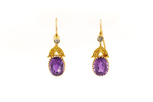Lot 136 - A pair of amethyst and diamond earrings, each...