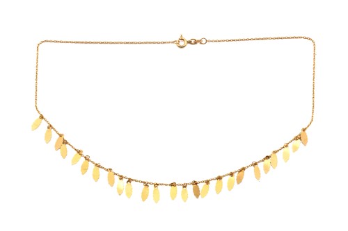 Lot 142 - A foliate fringe necklace, of leaf motif...