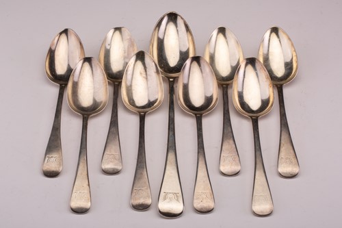Lot 433 - A set of eight George III silver Old English...