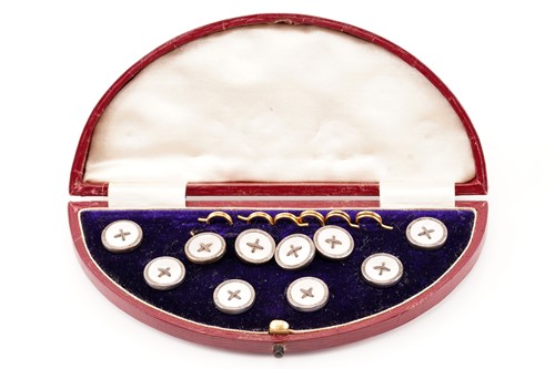 Lot 22 - A mother of pearl dress set in gilt metal, of...